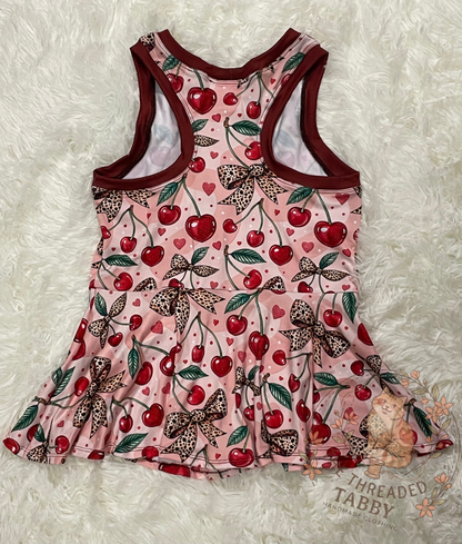 Kelsey Peplum | Cherry Leopard Bow