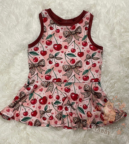 Kelsey Peplum | Cherry Leopard Bow