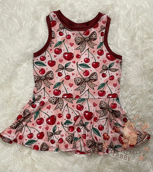 Kelsey Peplum | Cherry Leopard Bow
